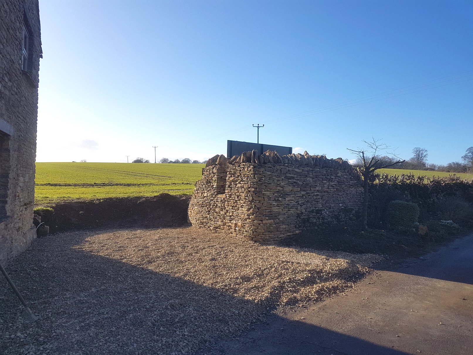 Leafield rebuild and laying chippings.